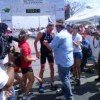 Panama Ironman winner 2012 is congratulated at the finish line.