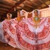 The winners display their beautiful red and white polleras in Las Tablas, Panama