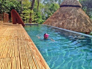 A Child swims in a pool at Isla Palenque Resort, Panama